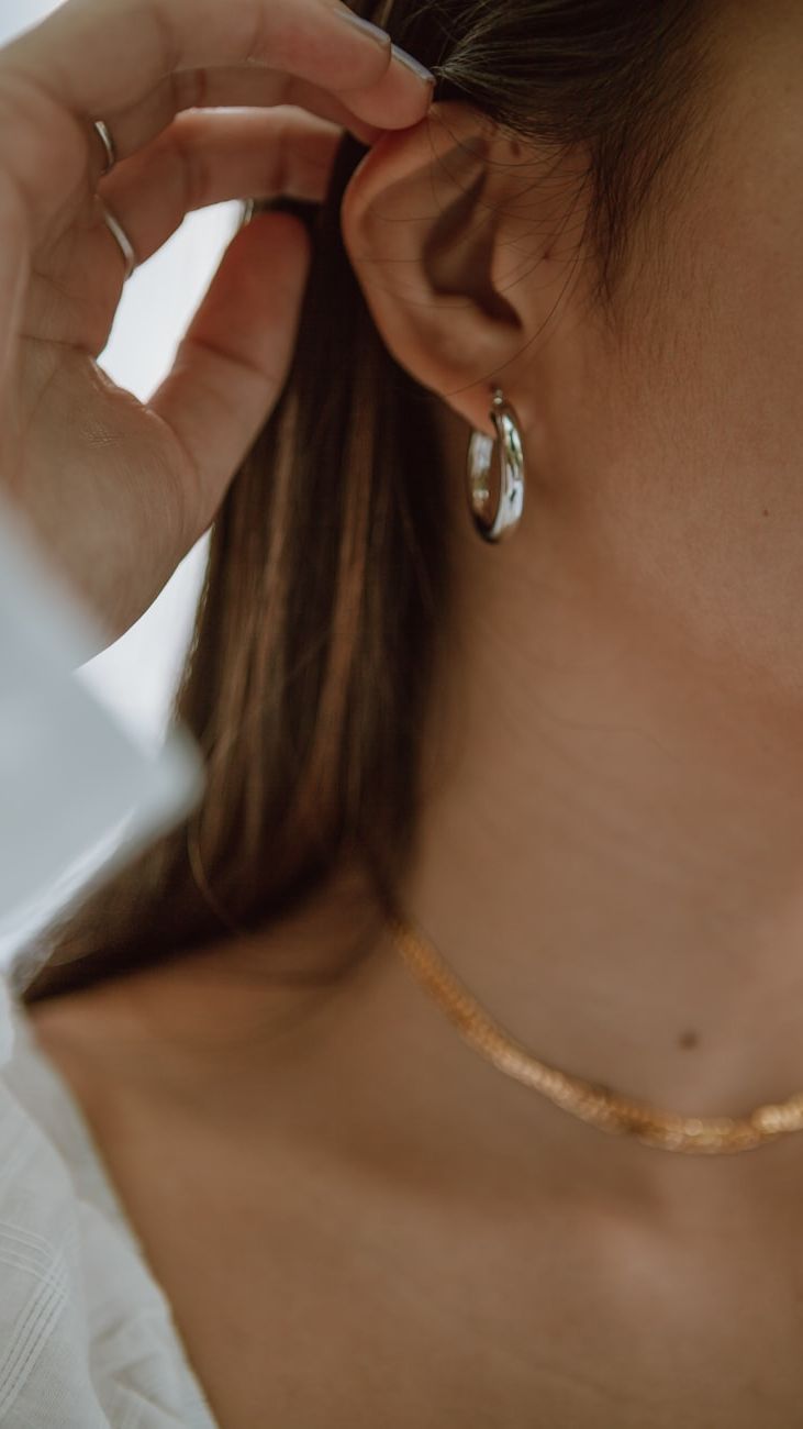 Secrets of Pairing Earrings with Other Jewelry: Stylist Tips